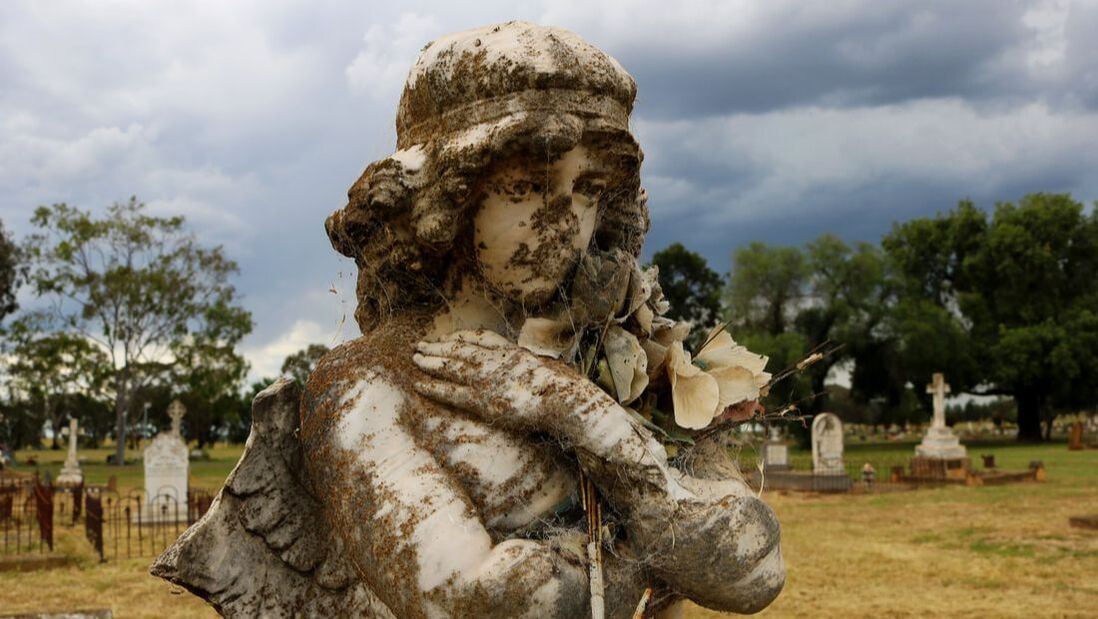 Angel atop grave
